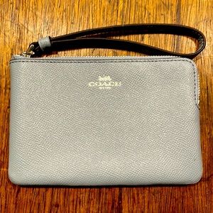 Coach Wristlet- Light blue with silver Coach emblem. Brand new w/ tags.